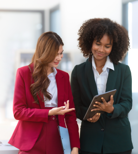 Two girls smiles on work